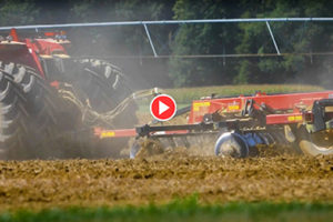 tractor tilling farm field in souther new jersey