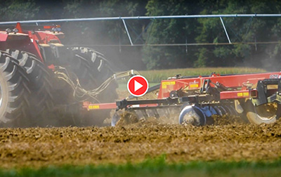 tractor tilling farm field in souther new jersey